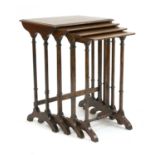 A quartetto nest of Victorian simulated rosewood and parquetry tables
