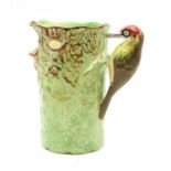 A mid- century Wetherby green Woodpecker jug,