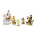 A collection of Staffordshire figures,