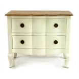 A serpentine fronted two drawer chest,