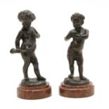 A pair of bronze musicians,