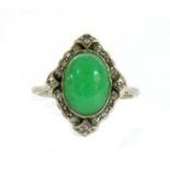 A platinum and white gold, jade and diamond cluster ring,