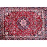 A hand knotted Persian carpet