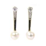 A pair of white gold pearl and diamond drop earrings,