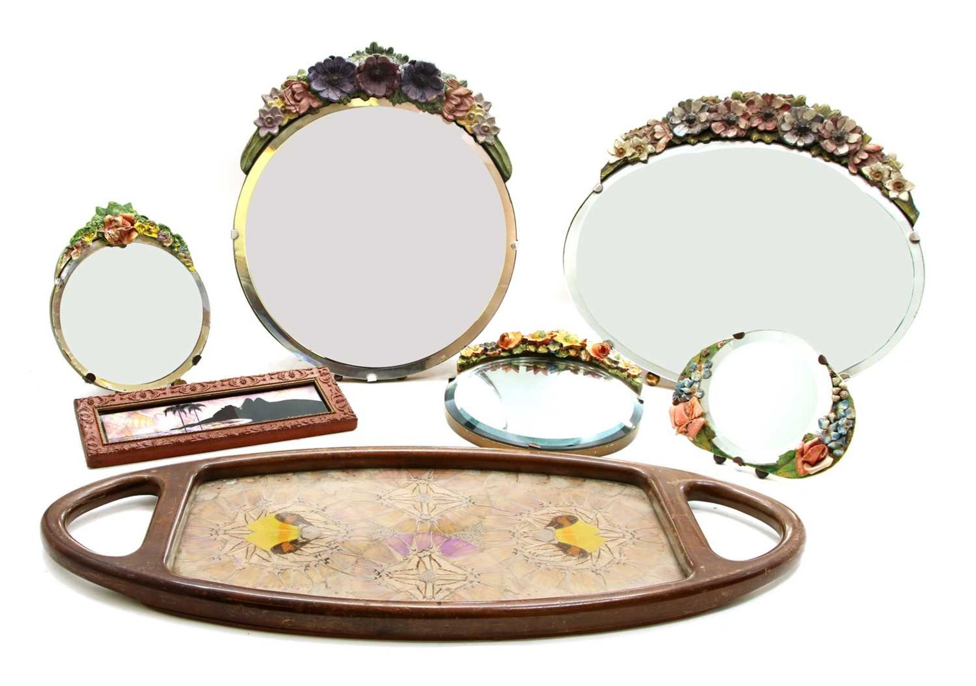 A collection of Barbola mirrors