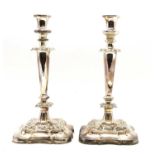 A pair of EPNS candlesticks