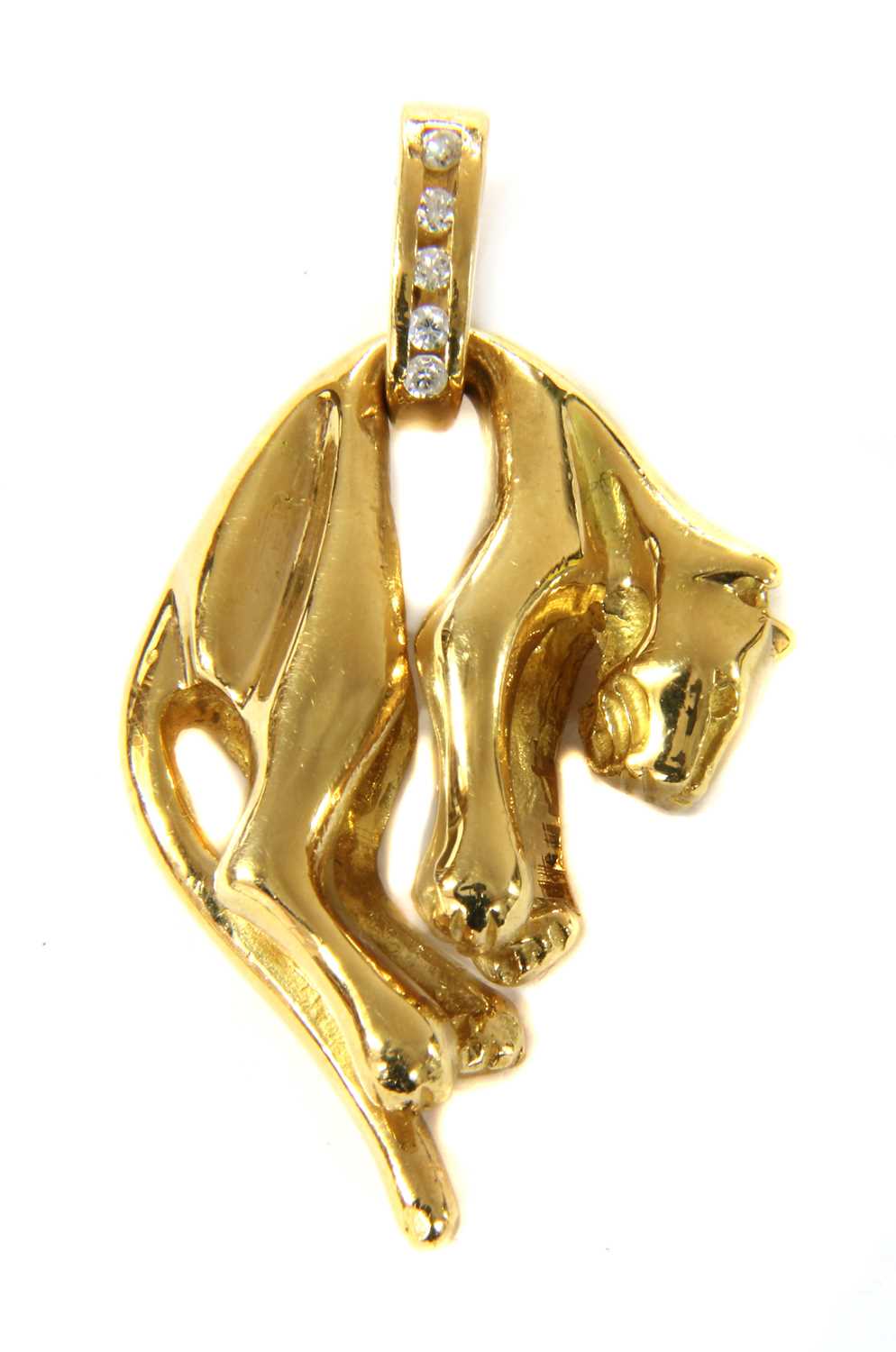 A gold diamond panther pendant,