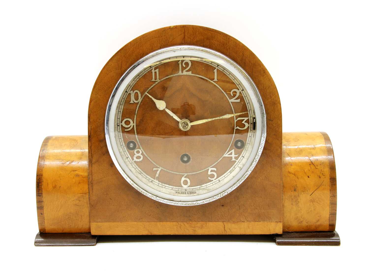 An Art Deco walnut mantel clock