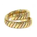 A Bulgari 18ct tri-colour gold Tubogas ring,
