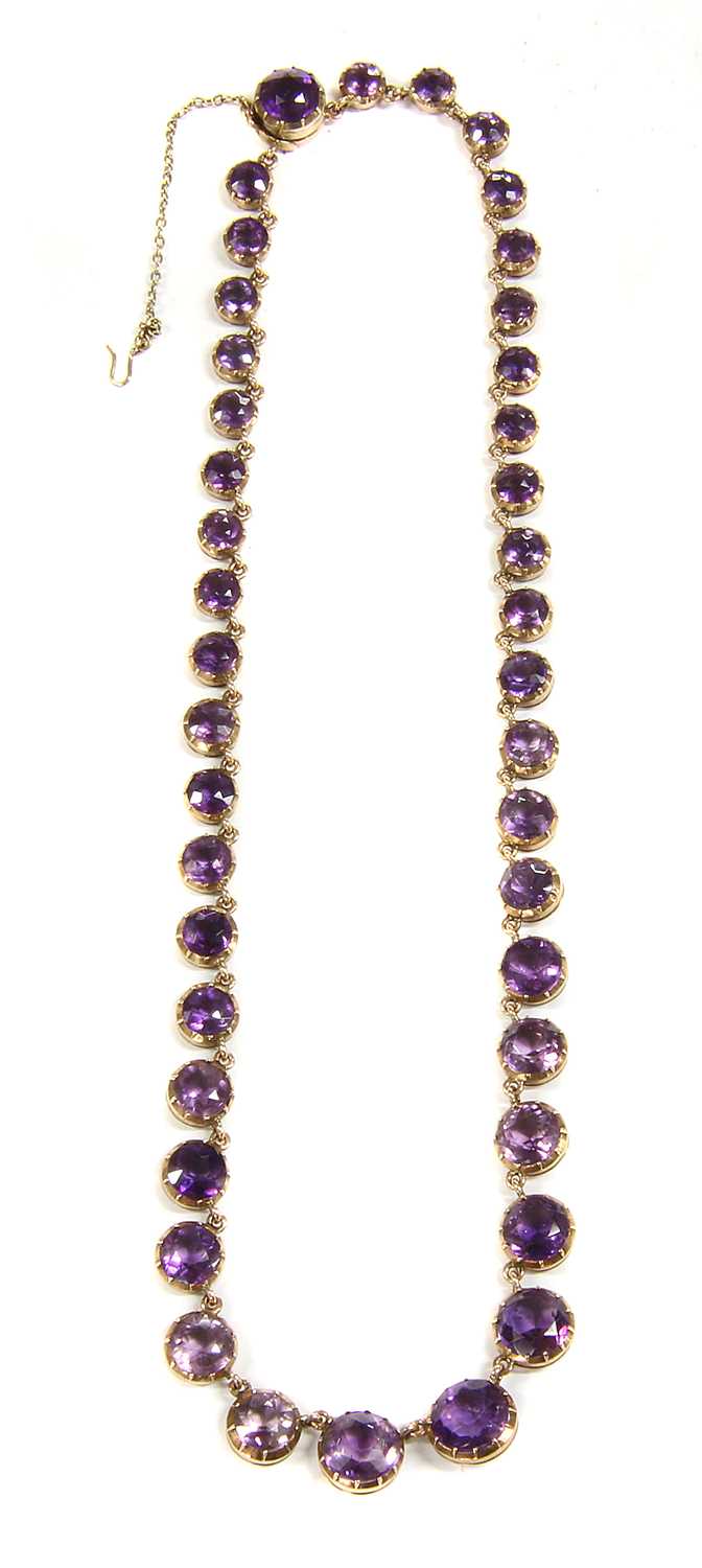 A Victorian gold amethyst graduated rivière necklace, c.1880,