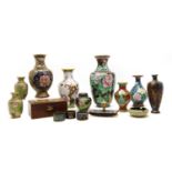 A collection of mixed Chinese and Japanese cloisonné vases and bowls