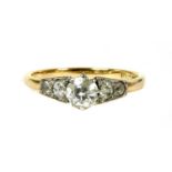 A gold and platinum diamond ring,