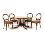 A Victorian inlaid walnut oval loo table