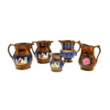 Five Victorian copper lustre jugs