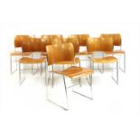 A set of eight stacking chairs,