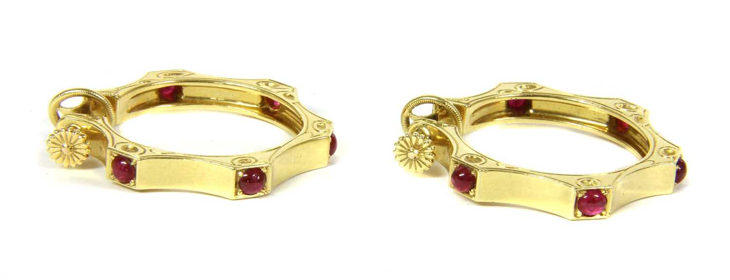 A pair of Cartier gold ruby hoop earrings,