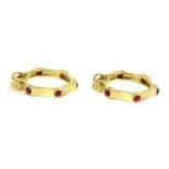 A pair of Cartier gold ruby hoop earrings,