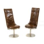 A near pair of chrome and leather aviator type swivel chairs