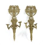 A pair of brass wall sconces,
