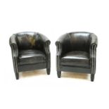 A pair of modern black leather and polished metal nailed tub armchairs (2)