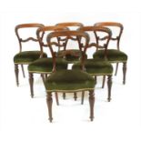 A set of six William IV mahogany balloon back dining chairs,