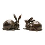 A pair of contemporary bronze rabbits