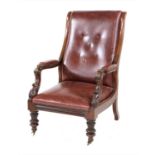 A Victorian mahogany and buttoned leather library armchair,