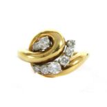 A gold diamond dress ring,