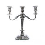 A silver three branch candelabrum,