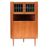 A Danish teak corner cupboard,