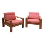 A pair of teak lounger chairs,