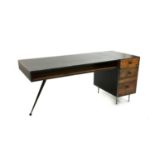 A contemporary metal and wood desk,