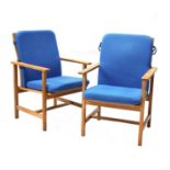 A pair of oak desk chairs,