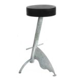 A galvanised stool,