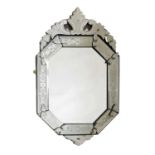 A Venetian-style wall mirror,