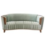 An Art Deco curved sofa,