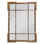 A large bamboo overmantel mirror,