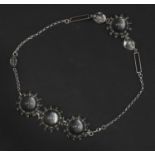 A silver rock crystal and glass necklace and bracelet suite,