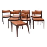 A set of eight Danish tan leather dining chairs,