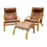 A pair of Scandinavian leather armchairs,