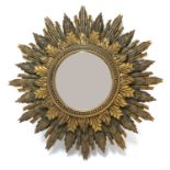 An Art Deco-style starburst composition mirror,