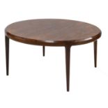 A rosewood circular coffee table, §