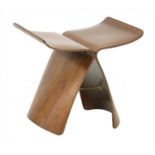 A walnut butterfly stool,