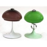 A composed pair of table lamps,