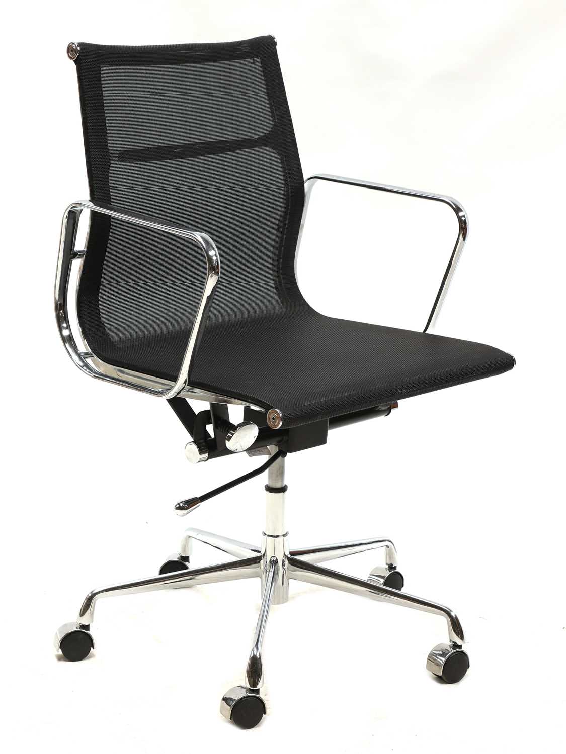 A black mesh and chrome office chair,