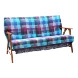 A Danish teak three-seater settee,