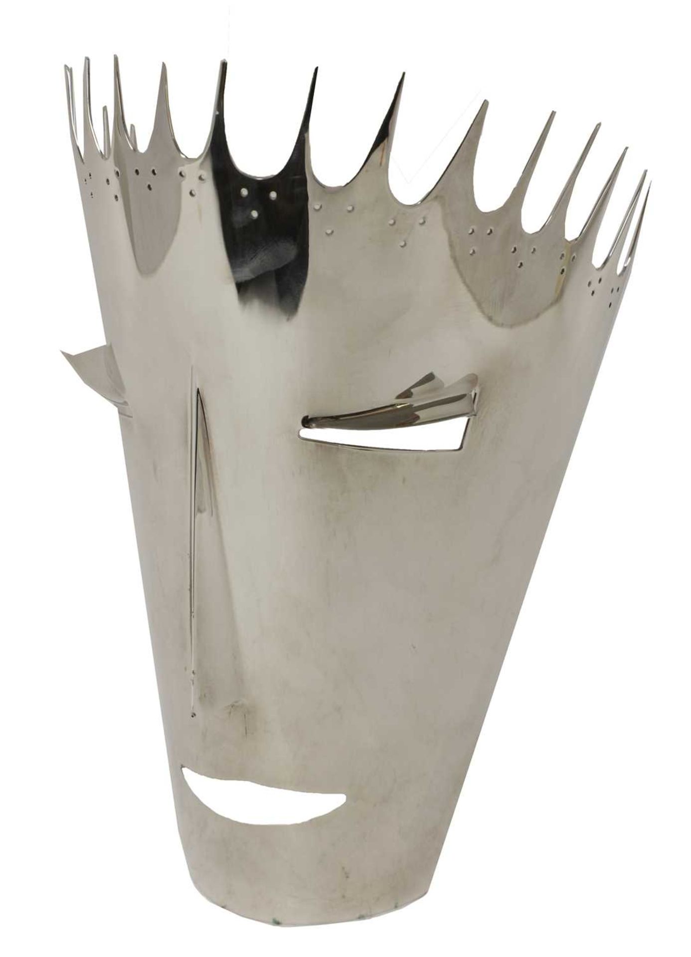 A silver-plated face mask,