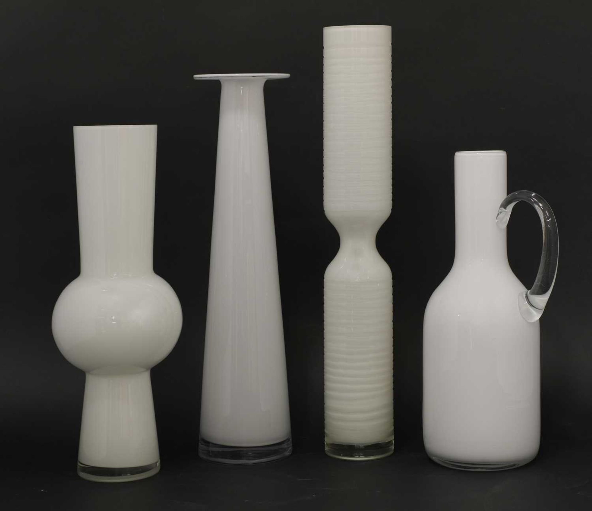 Four tall vases,