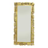 A Syroco brutalist wall mirror,