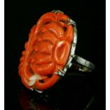 A white gold carved coral ring